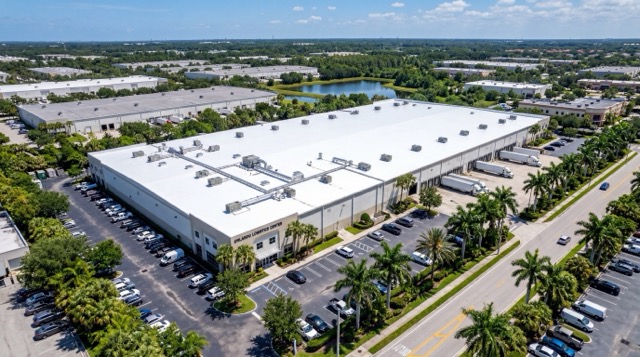 White TPO commercial flat roof on a Florida Gulf Coast business building